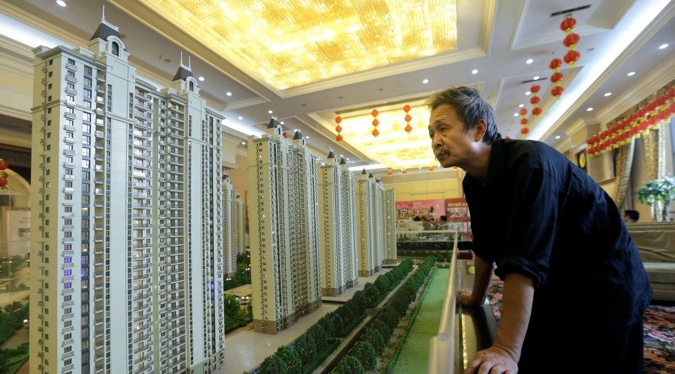 Evergrande agrees to buy stake in China developer Calxon for $553.8m