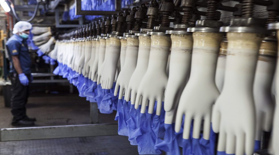 Malaysia's Top Glove shares tumble after govt says factories to be closed