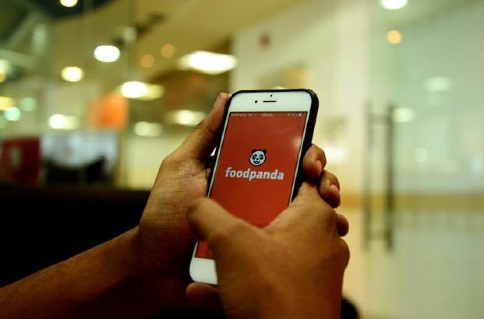 Ola suspends Foodpanda India's delivery business, lays off several employees