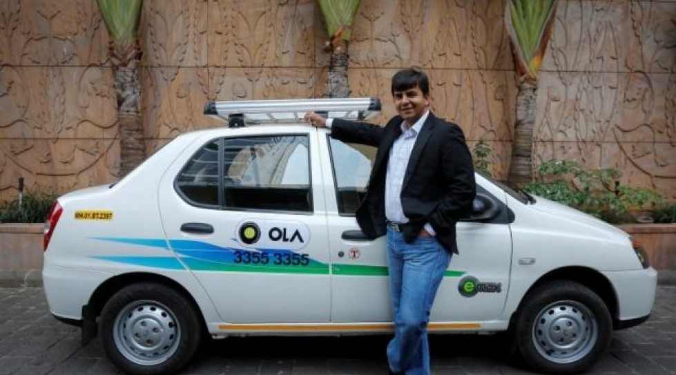 Uber competitor Ola may deploy 1m electric cars, says SoftBank’s Masayashi Son