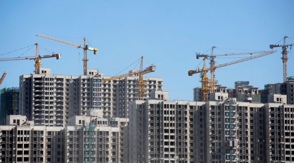 China Evergrande boosts stake in rival property developer Vanke