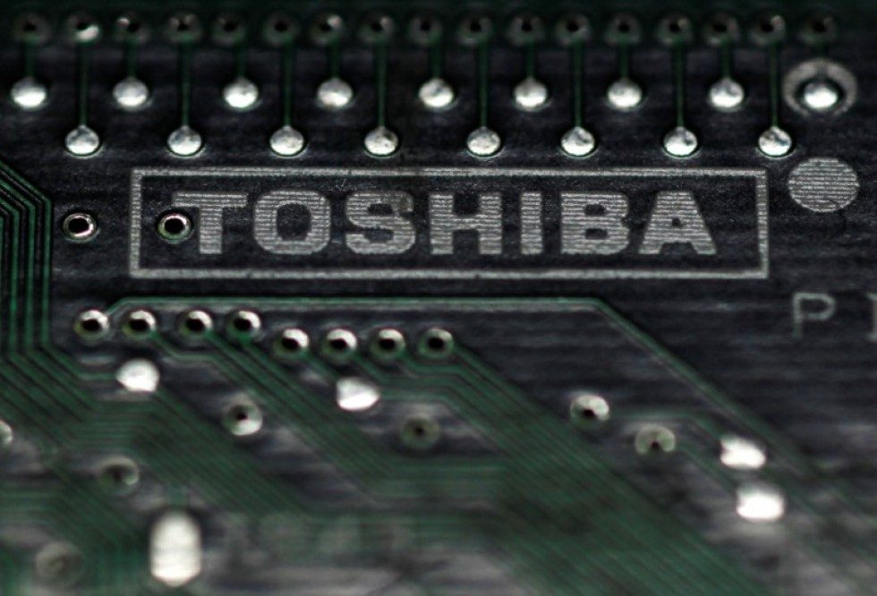 Shareholders of crisis-hit Toshiba vote out chairman at AGM