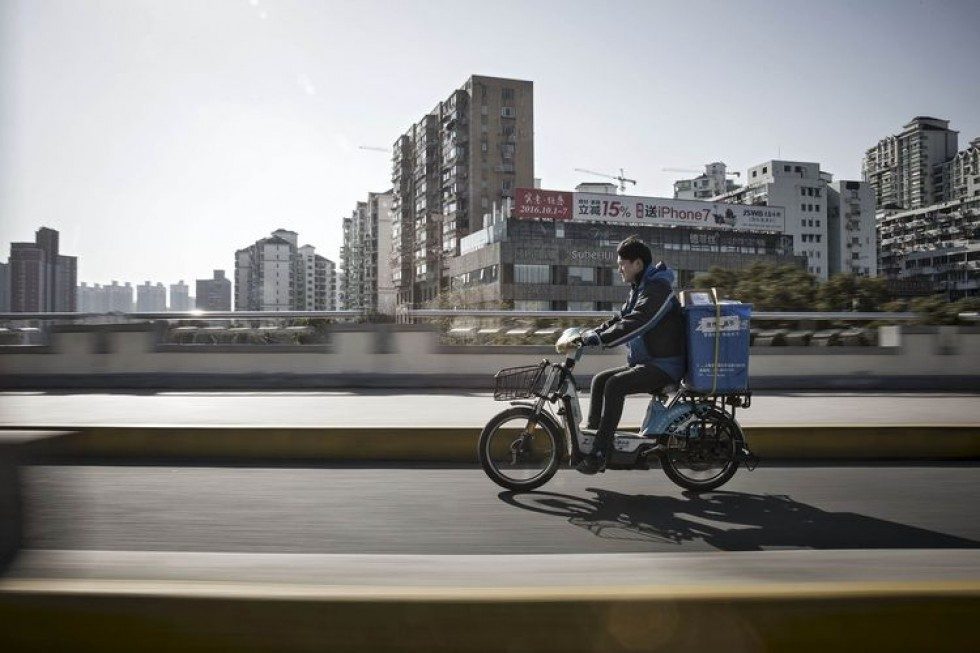 China's delivery firm ZTO, banks sued over 'inflated' margins in top 2016 US IPO