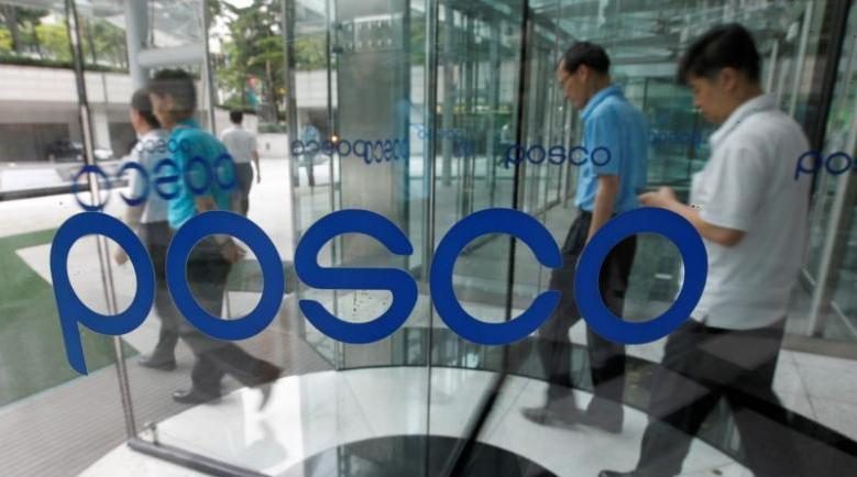 Asia Digest: Konica Minolta to buy Ambry Genetics; POSCO to sell KB Financial shares