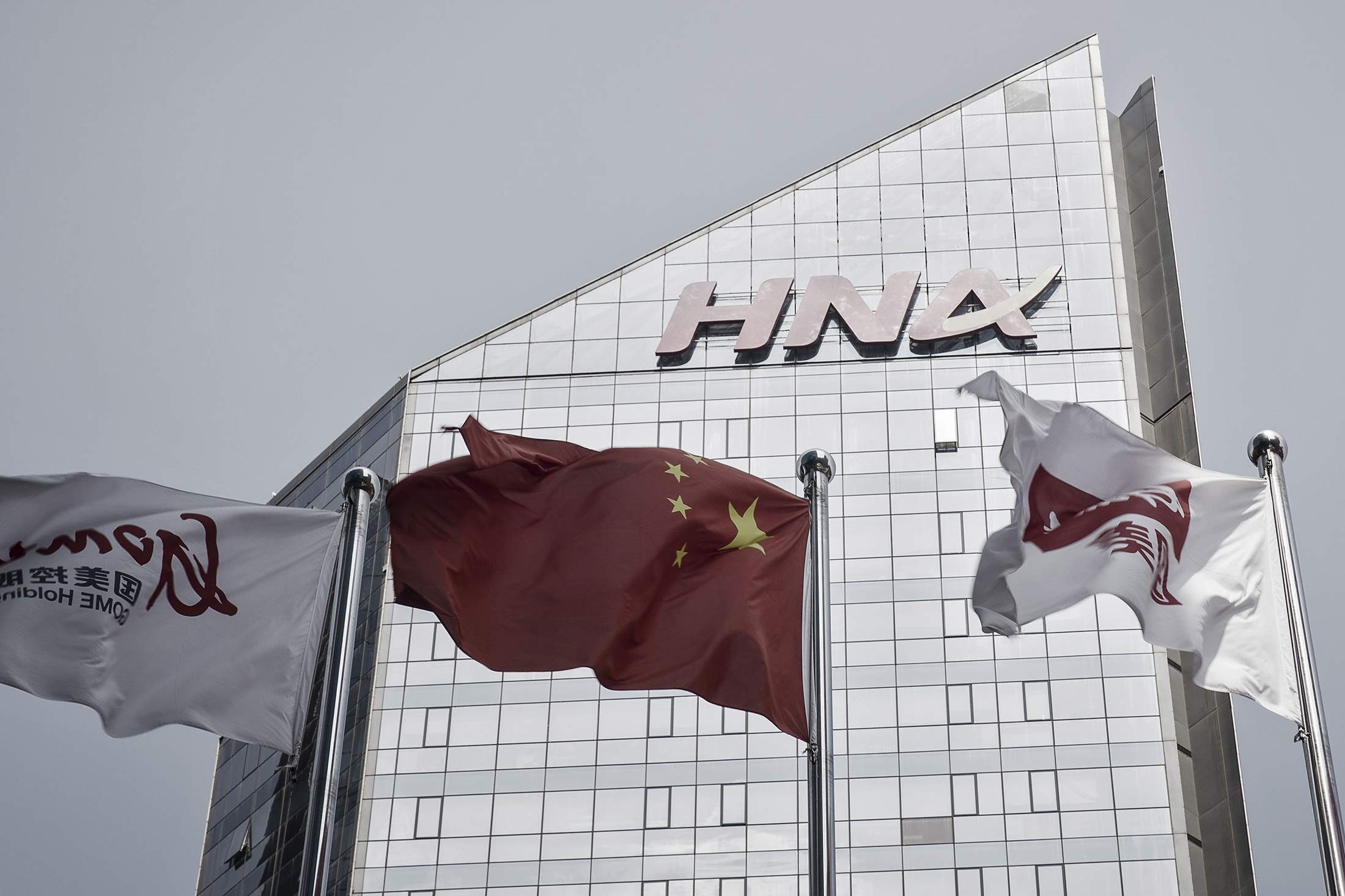 China's HNA considers asset sales, signals reversal of buying spree