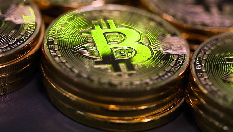 Bitcoin surges to record high of over $6,000
