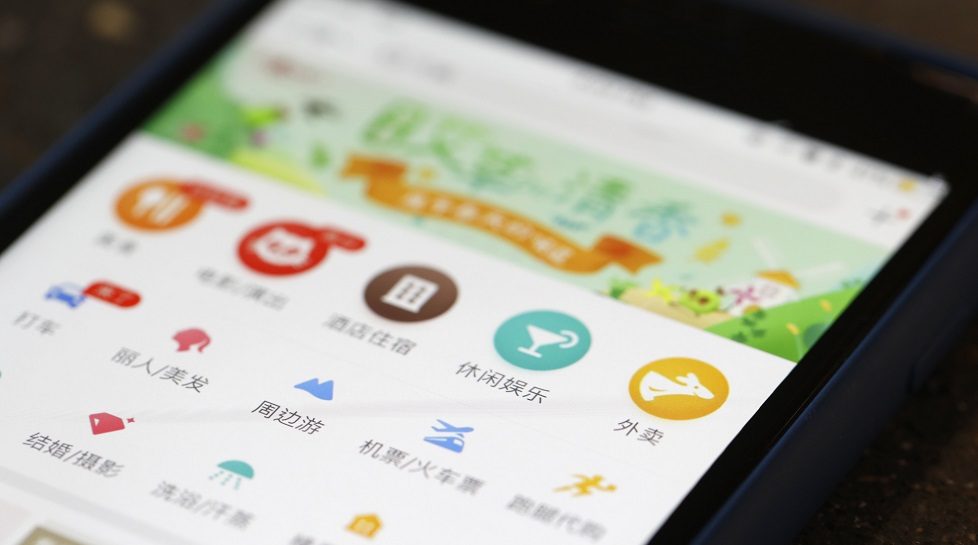 China's Meituan Dianping climbs 6% in Hong Kong trading debut