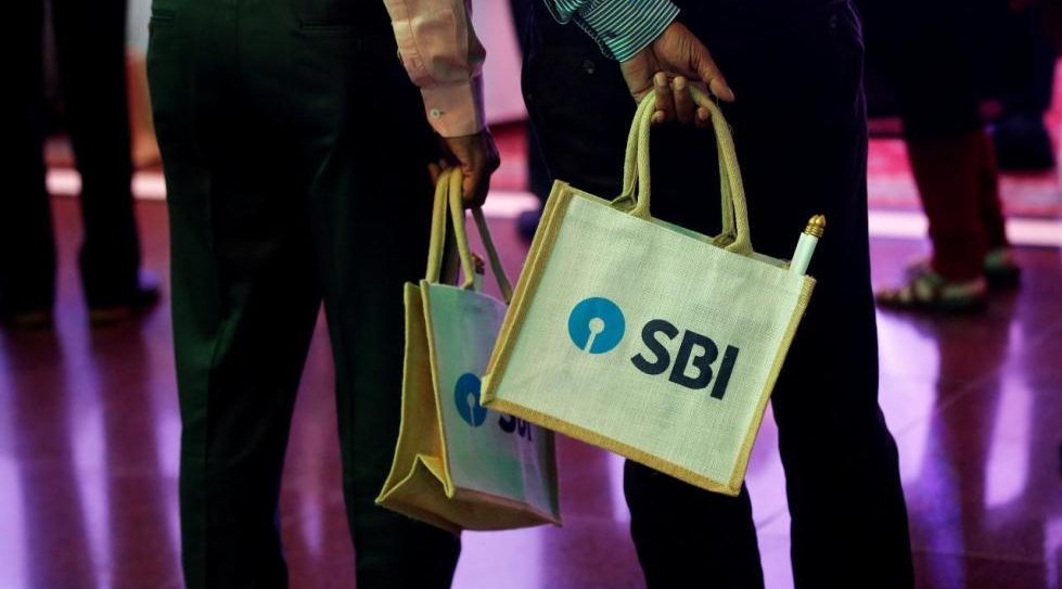Adani Group firms pledge additional shares for biggest lender SBI