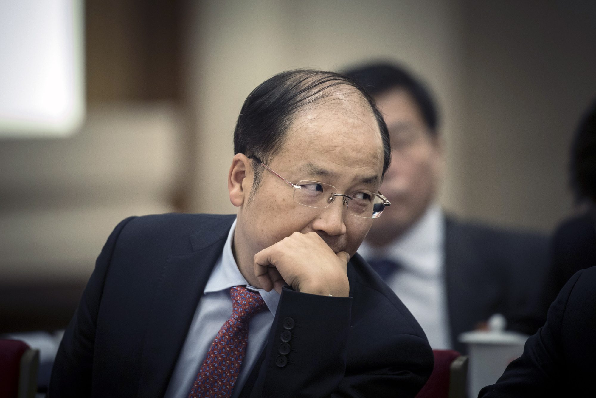 China names banking veteran Yi Huiman as head of securities regulator