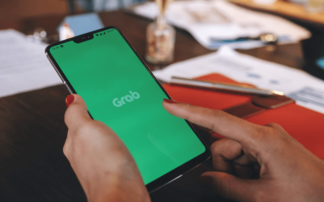 Grab trims full-year forecasts, says $40b SPAC merger on track