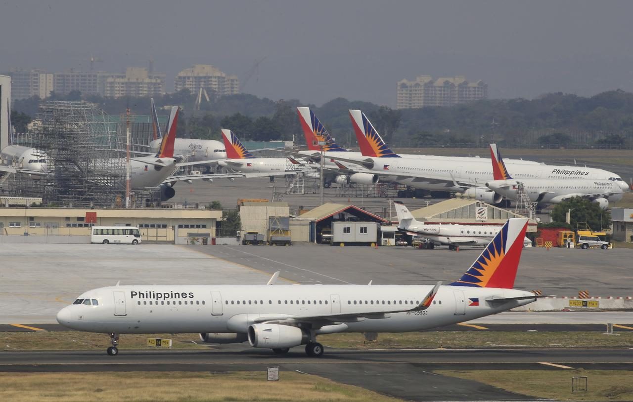 Philippine Airlines's parent posts record loss, prepares restructuring plan