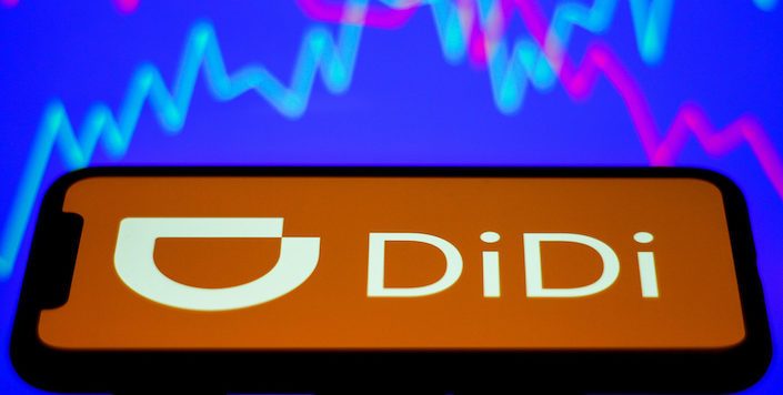 China's Didi sees 2022 revenue hit by pandemic, net loss narrows