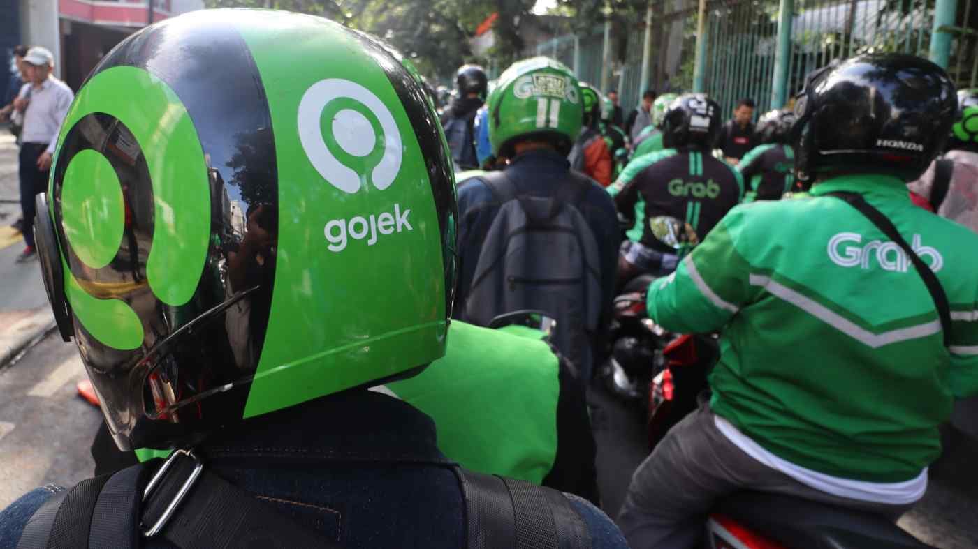 Ride-hailing giants Grab, Gojek commit to 'carbon zero' ahead of public listing