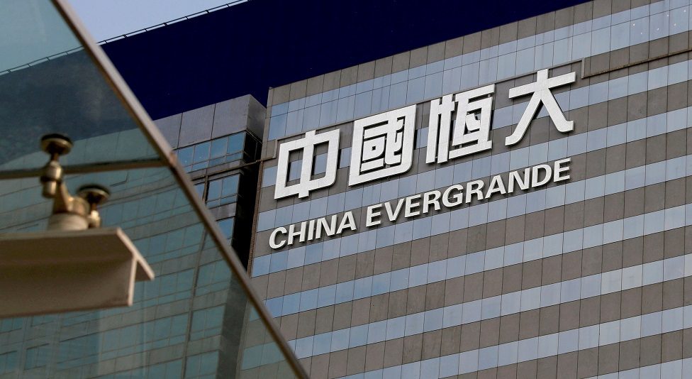Trading in shares of property developer China Evergrande, units halted