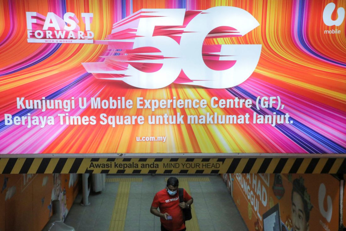 Four big telcos agree to take stakes in Malaysian govt's 5G agency