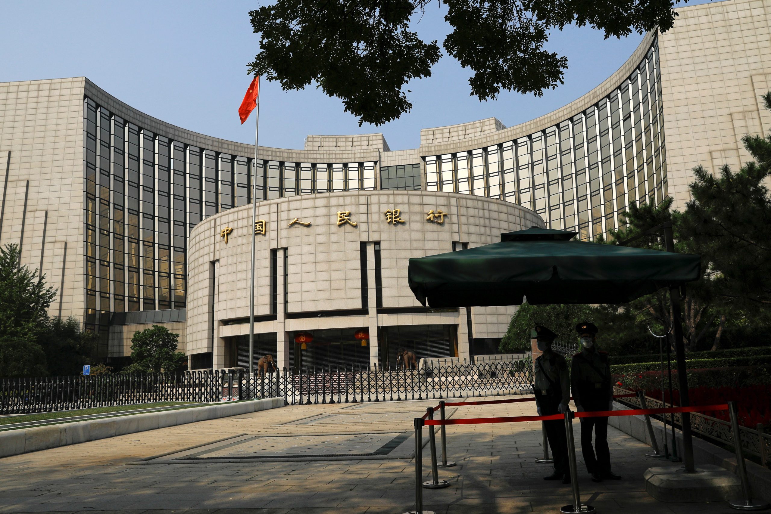 China central bank vows to support private firms, ease tech crackdown
