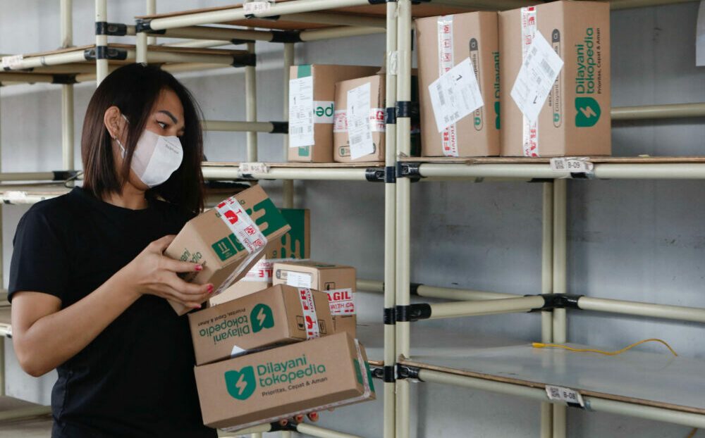 Indonesia's GoTo nearly halves net loss in H1, says on course for profitability this year