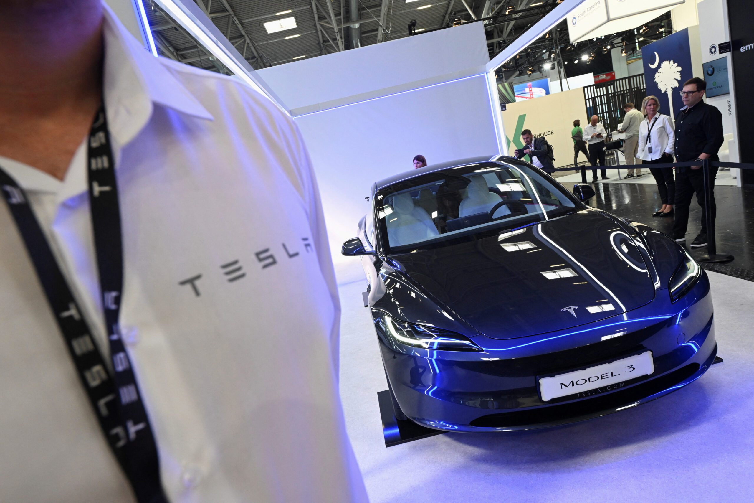 Tesla rolls out record cars in Q4, but China's BYD overtakes in EV race