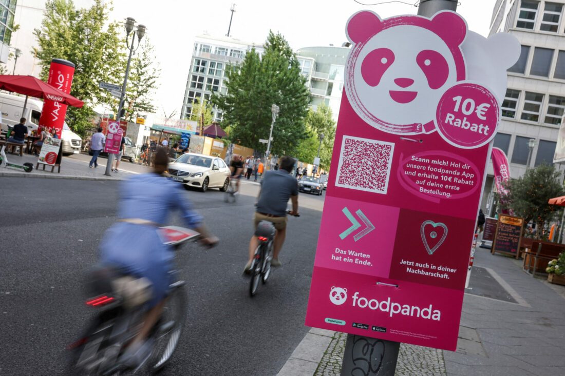 Grab, Delivery Hero talks came under Singapore competition watchdog's radar