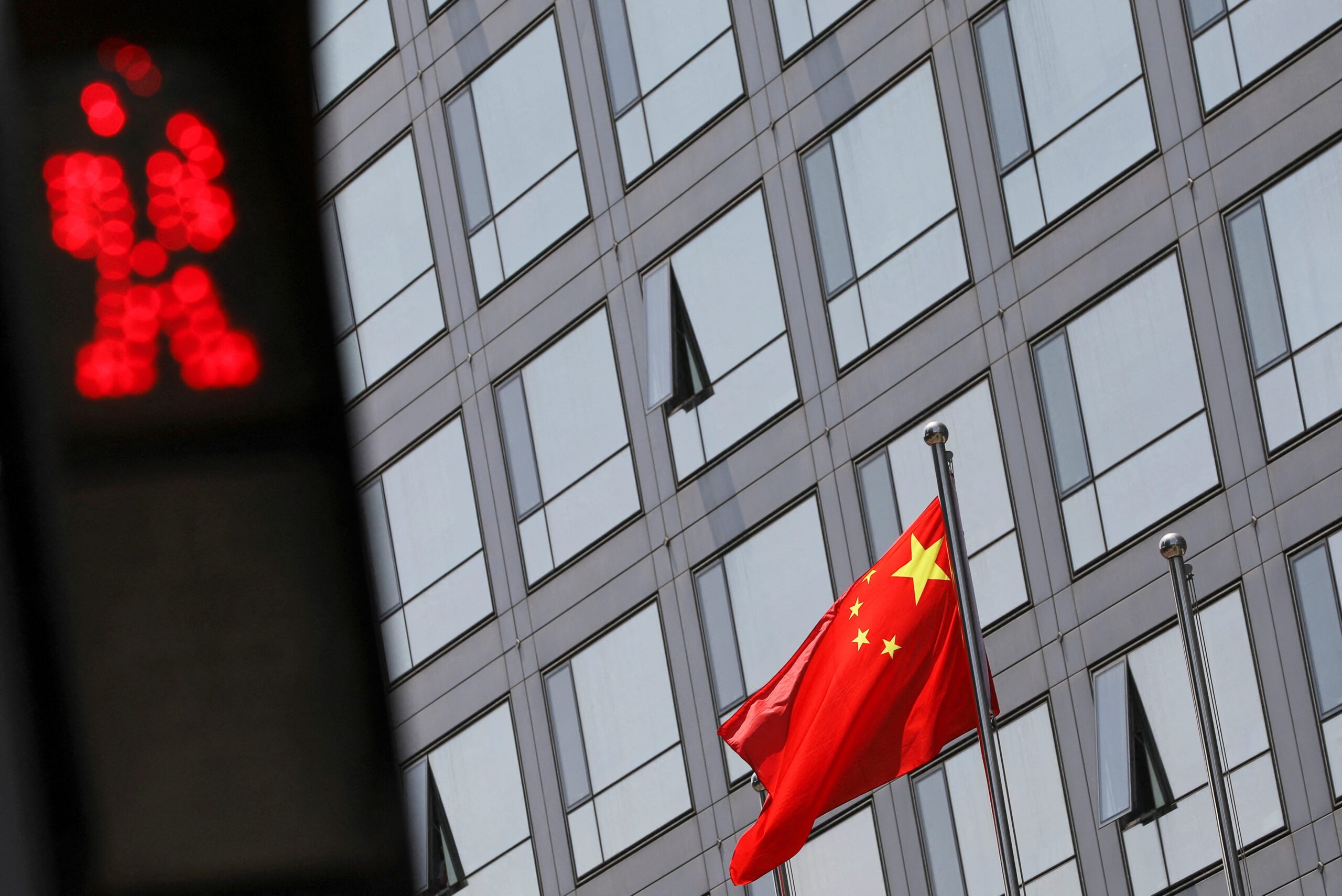 China securities regulator vows to strengthen oversight, resolve risks