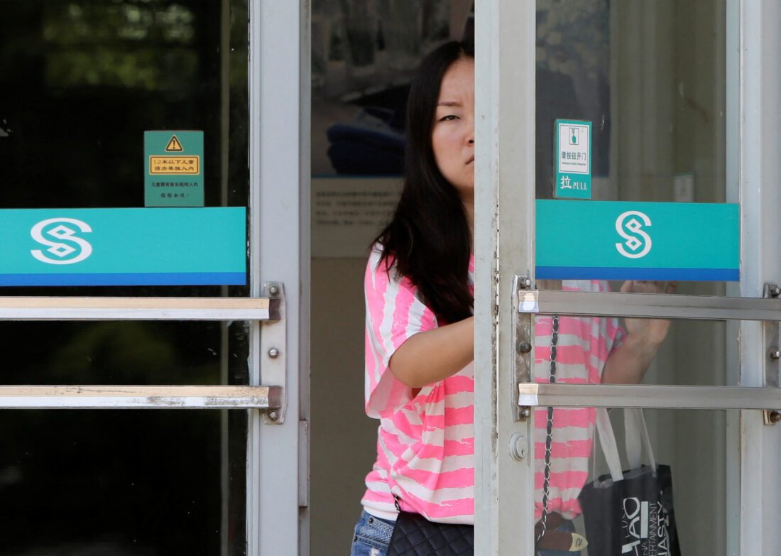 China Minsheng Bank halves Beijing staff salaries in austerity drive