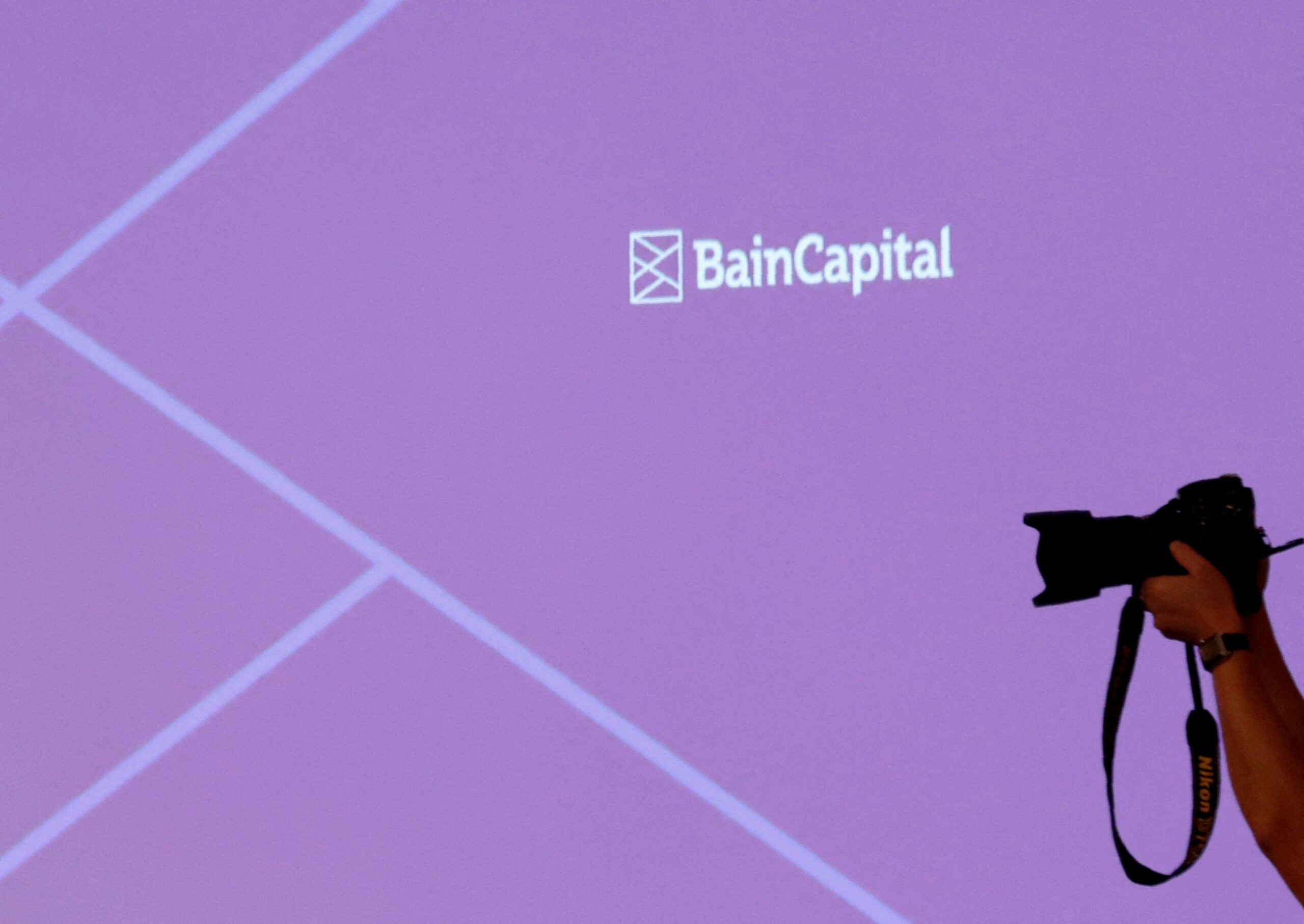Fuji Soft board backs KKR's buyout offer, founder bats for Bain
