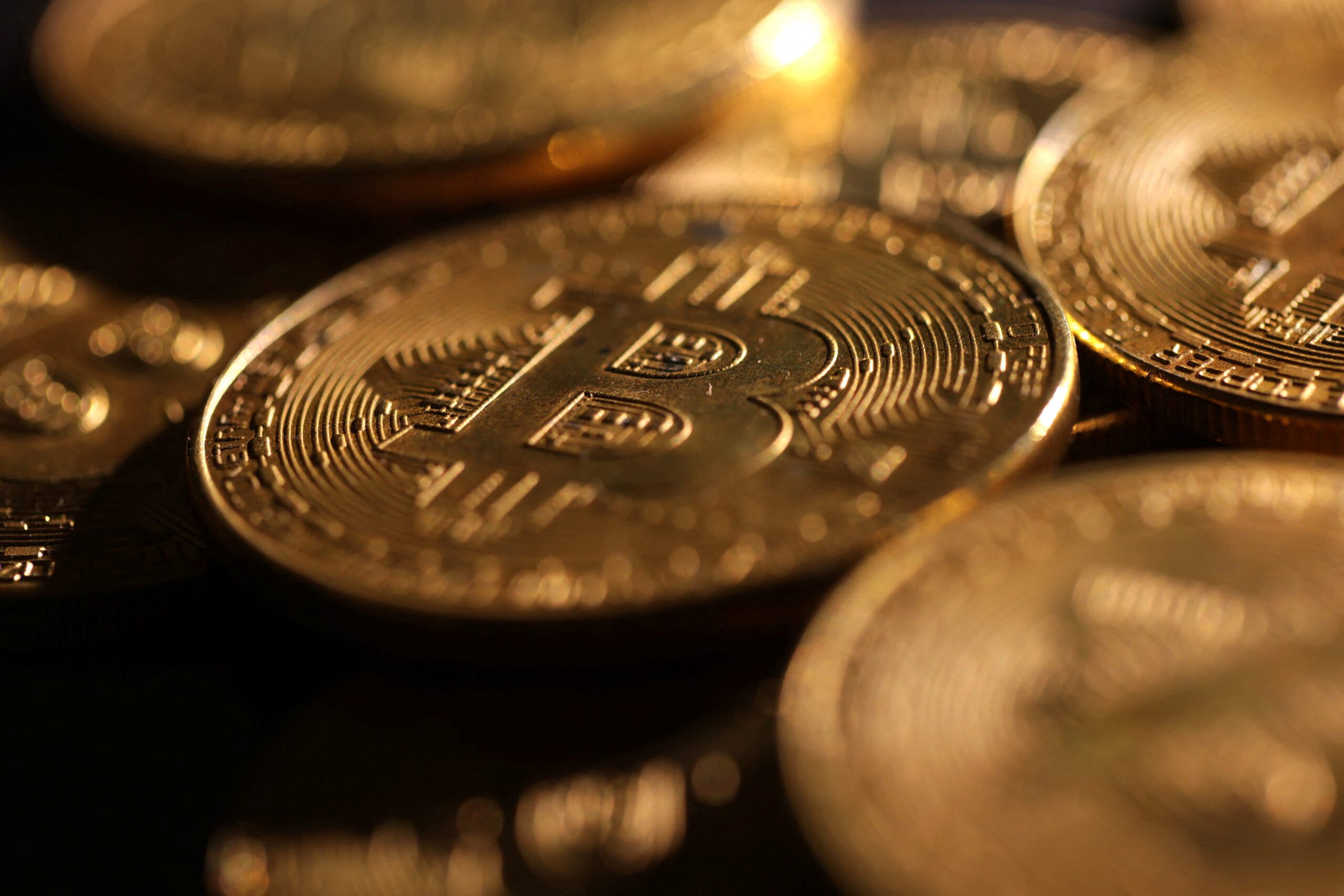 Bitcoin slides below $100,000 as Trump tariffs rattle markets