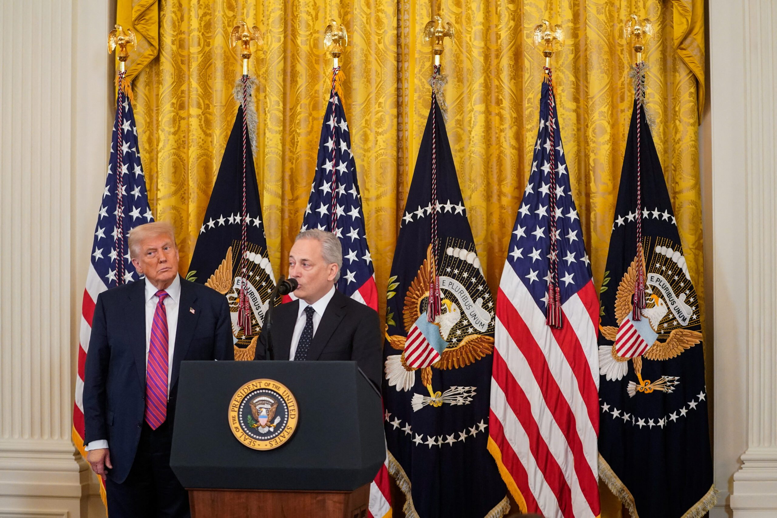 Trump signs stablecoin law as crypto industry aims for mainstream adoption