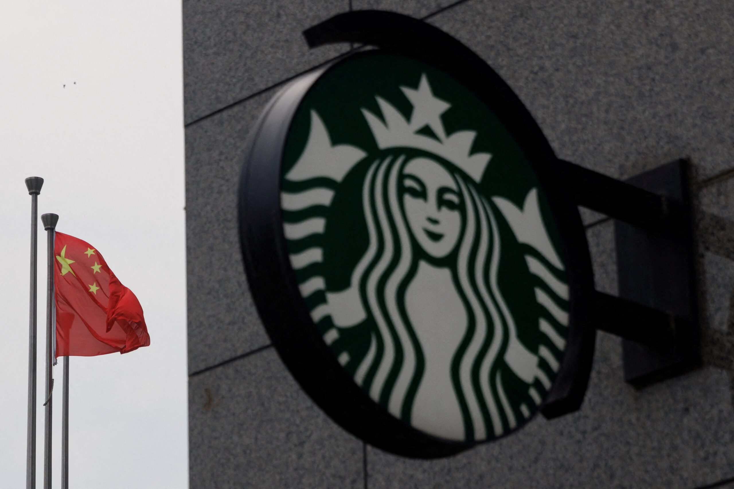 Starbucks expects non-binding bids for China business in two weeks