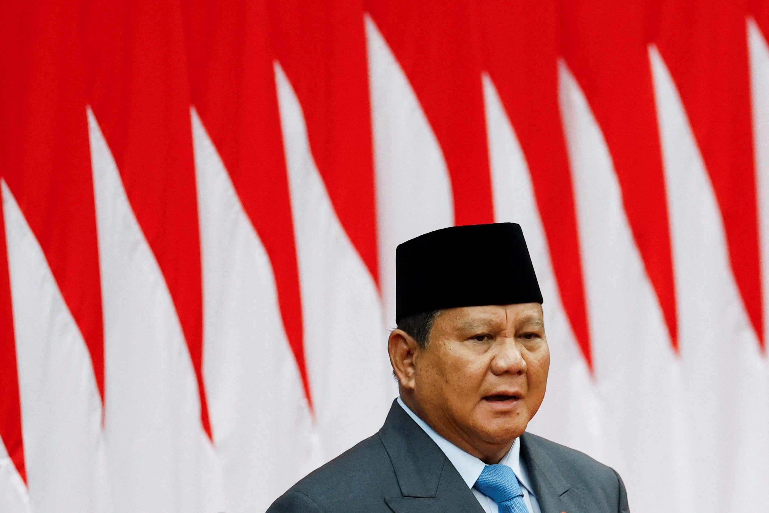 Indonesia in talks with ride-hailing firms to ensure fair competition, drivers' jobs